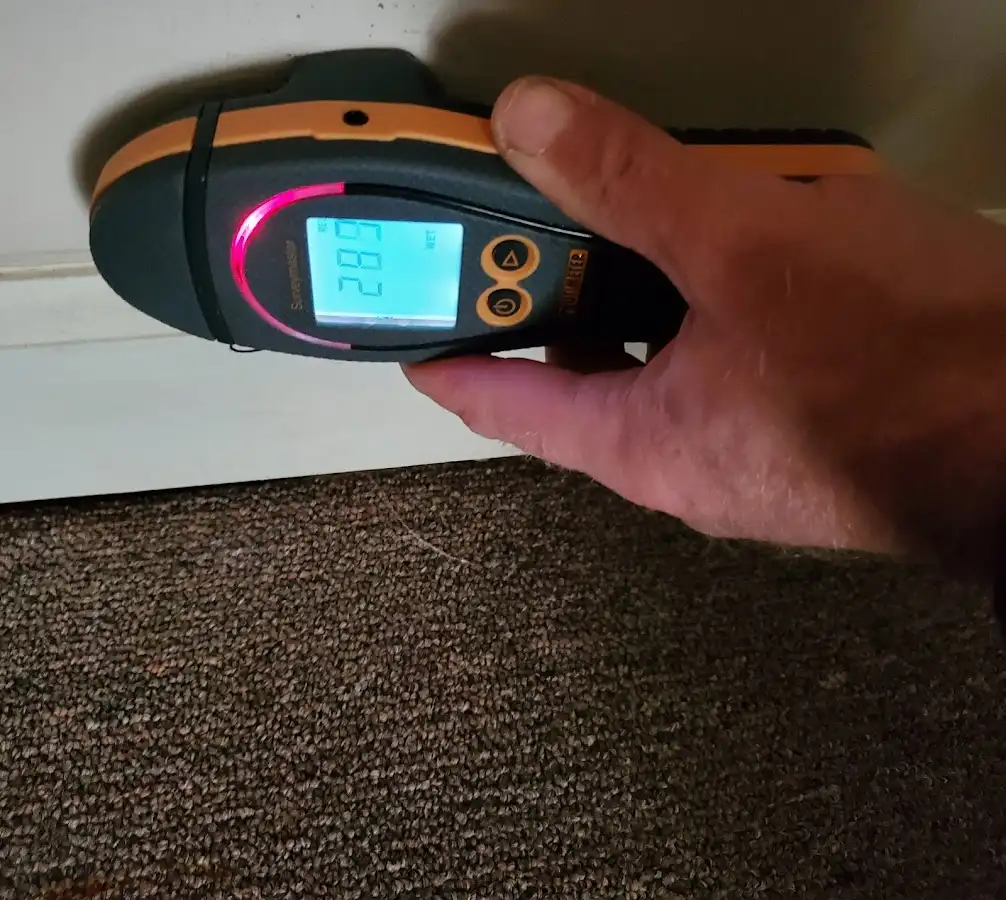 Moisture detection at baseboard during Storm Damage Restoration in Temple City